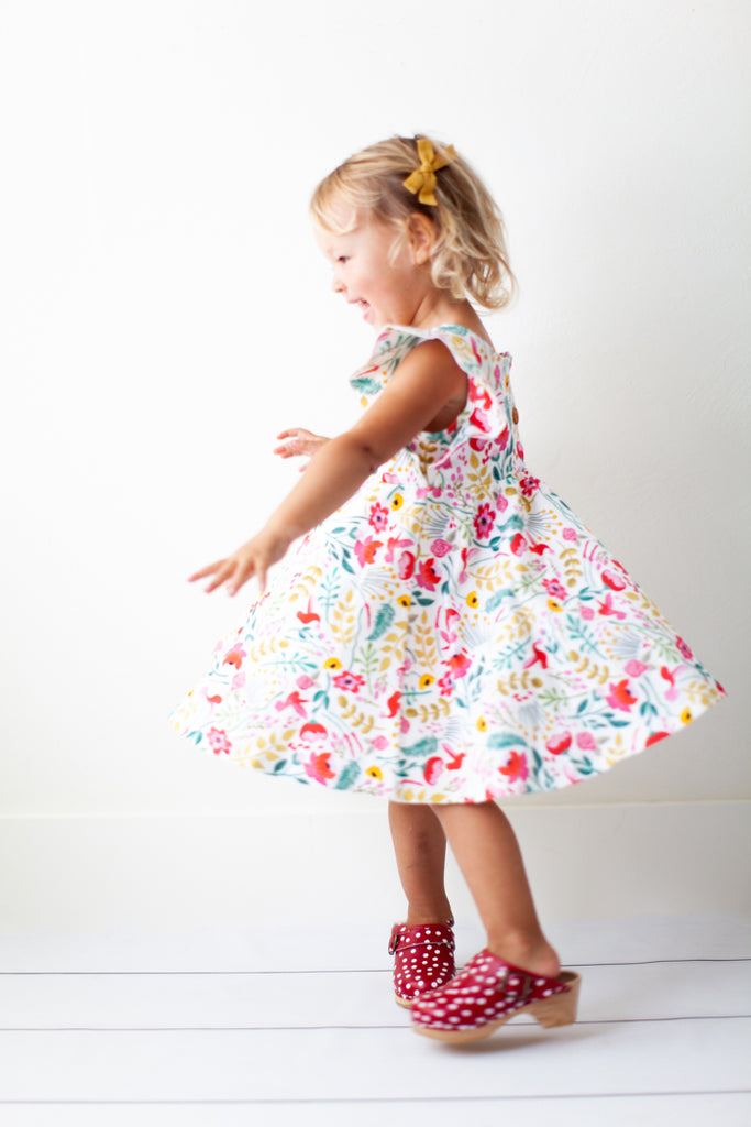 Ruffle twirl dress in Hummingbird Garden